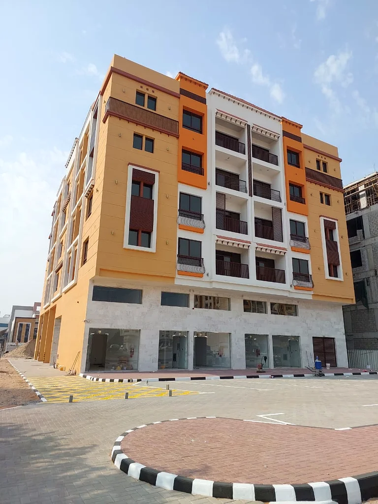 Building on the hill in Ajman, on Mohammed bin Zayed Street, 32 apartments, 5 shops, on Mohammed bin Zayed Street63254980324225111