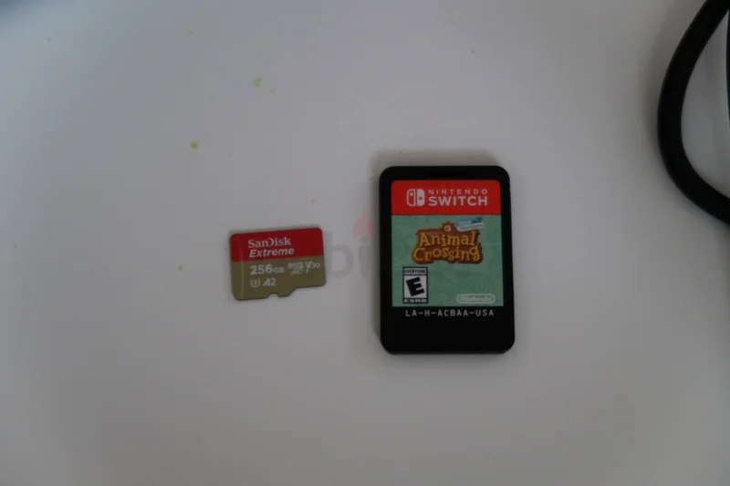 Nintendo Switch + Animal Crossing + Case + Memory Card63200648695043111