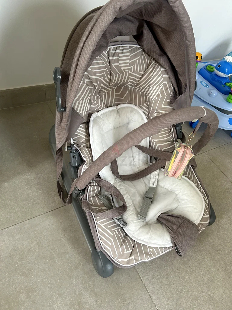 Gently used Baby bouncer for 80 Aed63205890738305113