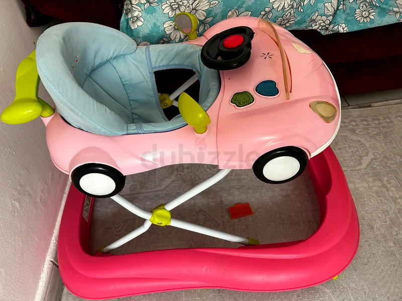 Charming Pink Baby Walker - Fun and Safe with music system.63204860306178111