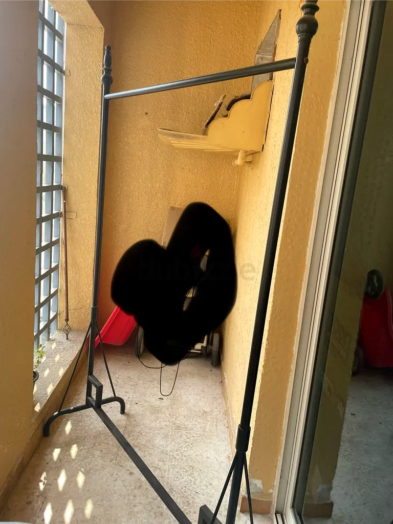 Stylish and Versatile Clothing Rack for Sale!