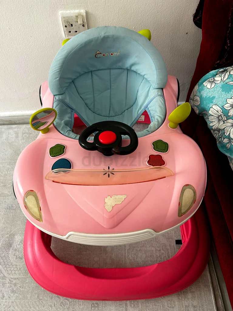 Charming Pink Baby Walker - Fun and Safe with music system.632048603061781128