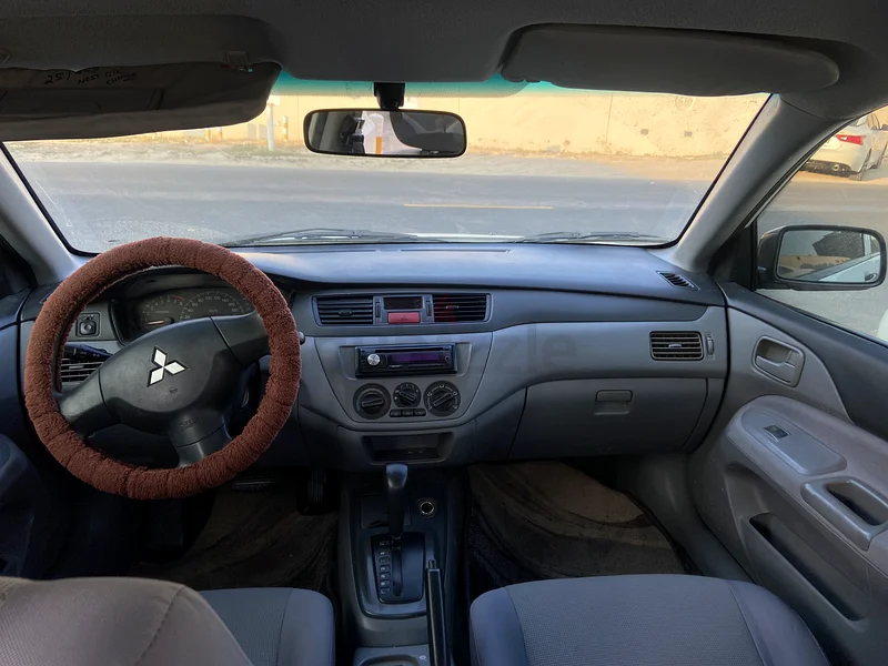 MITSUBISHI LANCER 2010 WITH VALID MULKIYA  TILL JUNE 2026 AVAILABLE FOR SALE.63172651069698111