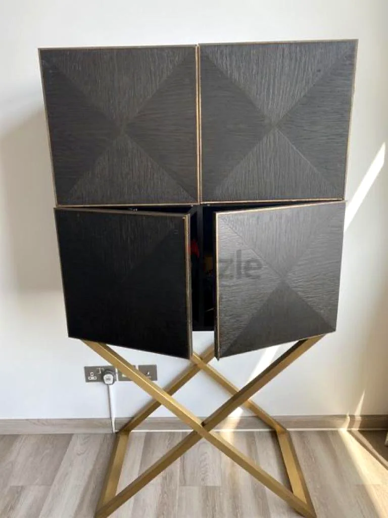 Sleek and Stylish Bar Cabinet - Perfect for Entertaining! From Marina Home63221348565635111
