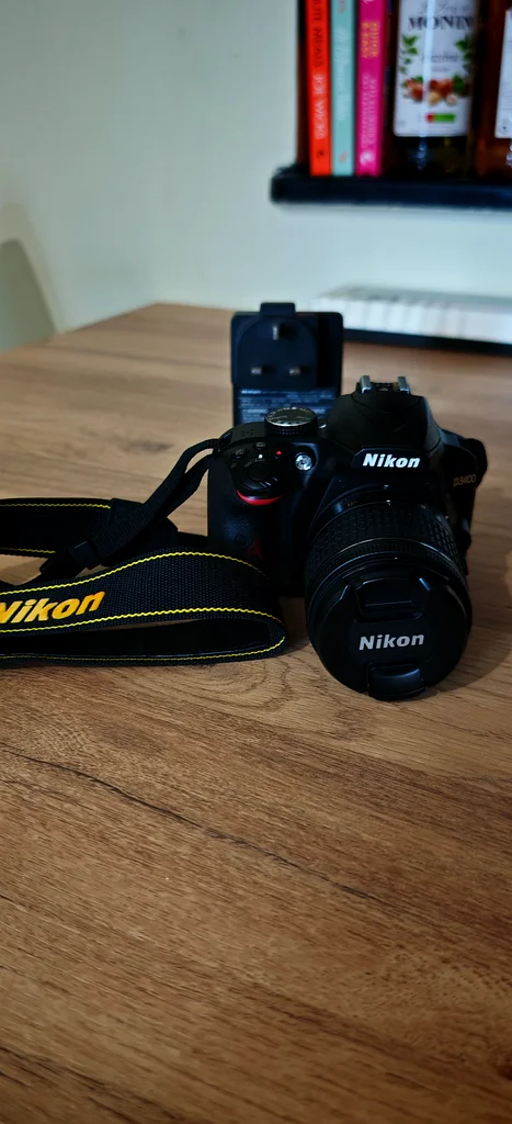 Capture Your Moments with the Nikon D3400 DSLR Camera!63172679119106111