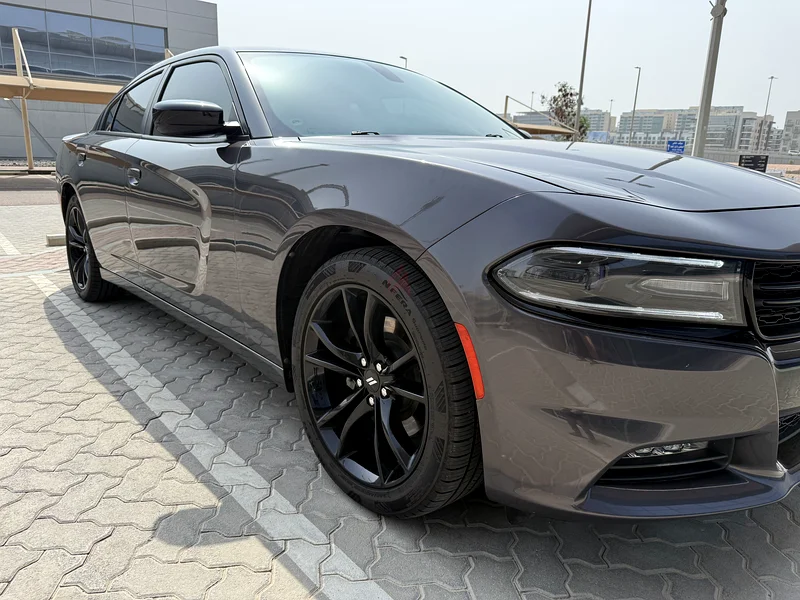 دودج تشارجر SXT. خليجي. كيلومترات قليلة. صوت ألباين. جنوط 20 بوصة. إصدار أسود مع جناح خلفي631527510397461113