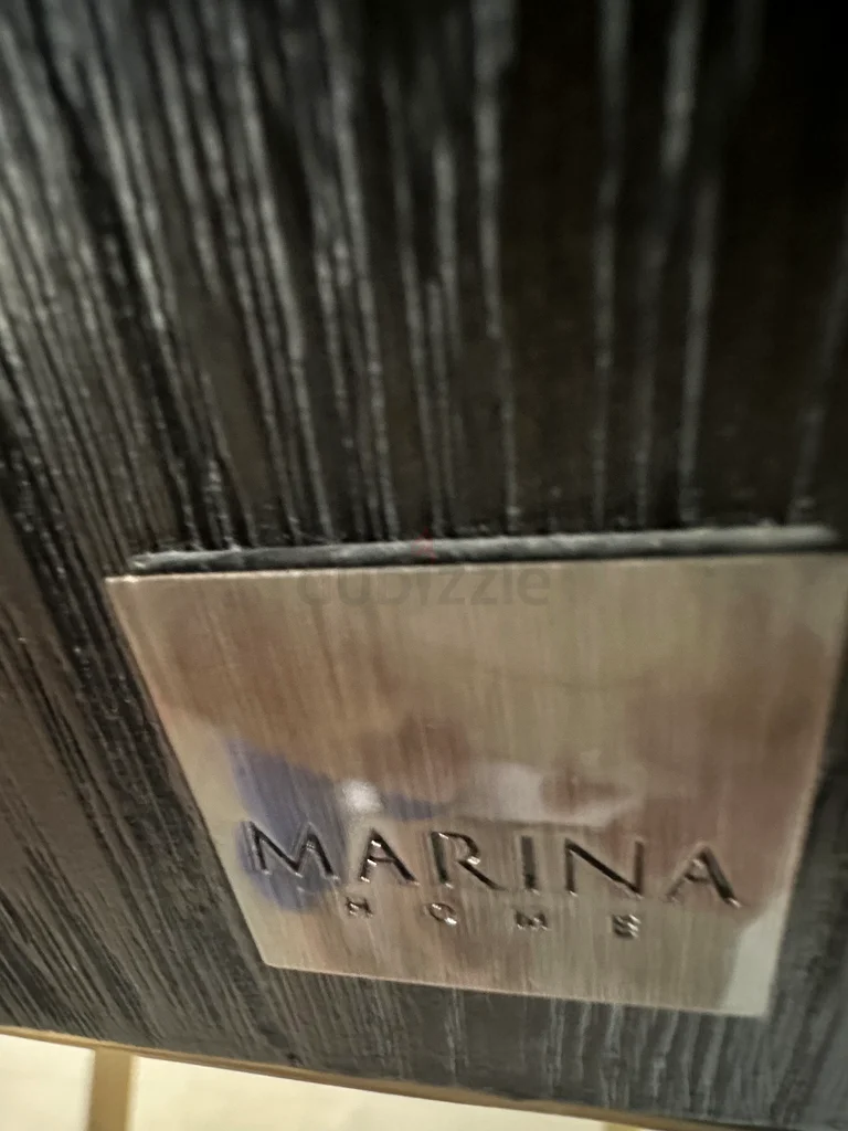 Sleek and Stylish Bar Cabinet - Perfect for Entertaining! From Marina Home63221348565635112