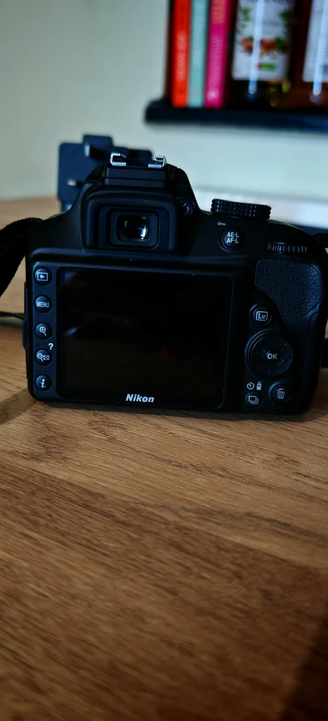 Capture Your Moments with the Nikon D3400 DSLR Camera!63172679119106114