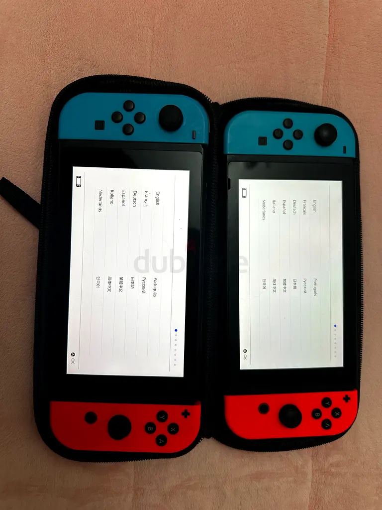 2 Nintendo Switch Consoles in perfect condition with Carrying Case - Game On!