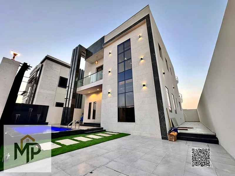 For sale - a luxury villa with a swimming pool in a prime location in Ajman, high-end finishing, modern design, including registration and swimming63897419956355110