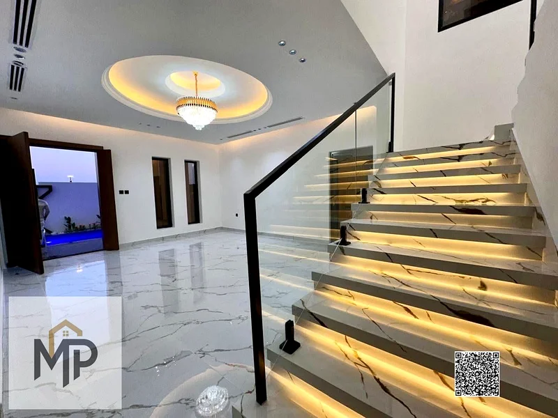 For sale - a luxury villa with a swimming pool in a prime location in Ajman, high-end finishing, modern design, including registration and swimming63897419956355112