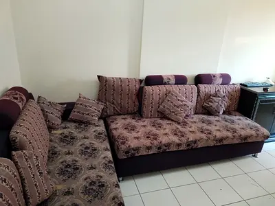 Elegant L-Shaped Sofa with Cushions - Perfect for Your Living Room!