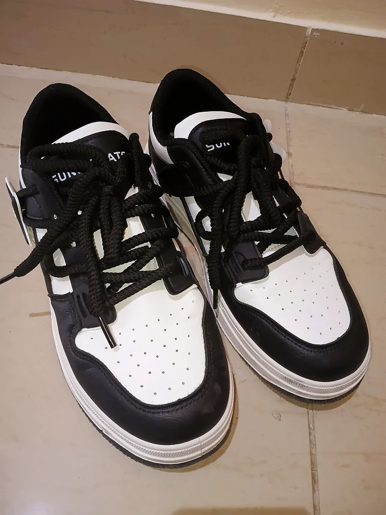Stylish Black and White Sneakers for Sale63237615351169110