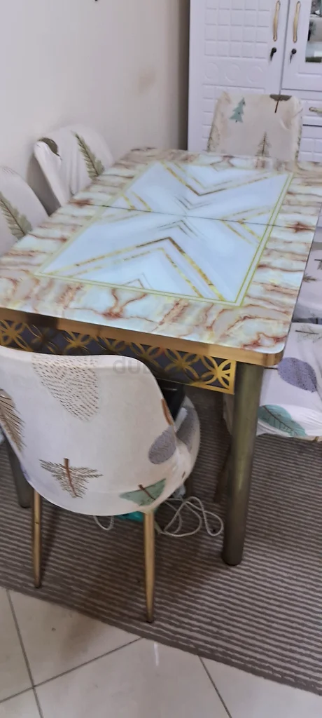 طاولة طعام أنيقة بتصميم فريد + 6 كراسي63217328322563112