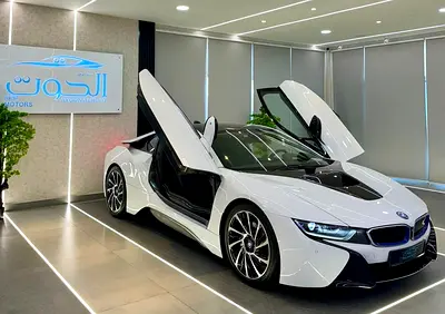 ELITE BMW I8 || GCC II FULLY LOADED || ACCIDENT FREE || VERY LOW MILEAGE || F.S.H BMW
