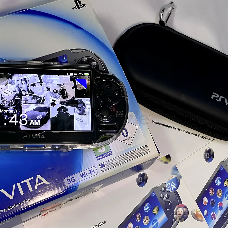 PS Vita with original box +150 games and more63231695283073111