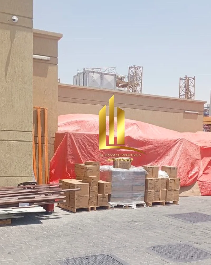 A warehouse with a fence in Al Sajaa Industrial Area, an area of ​​20,000 square feet, newly built two months ago, with an annual income of 540,000 di63195603080706113