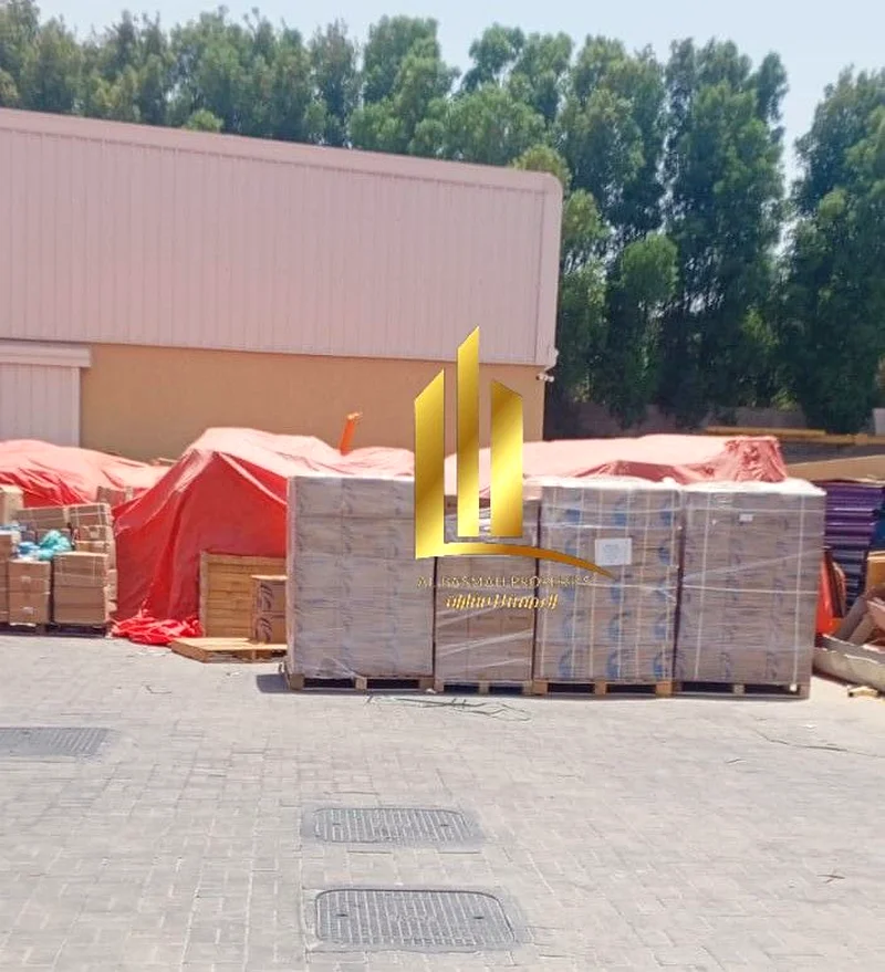 A warehouse with a fence in Al Sajaa Industrial Area, an area of ​​20,000 square feet, newly built two months ago, with an annual income of 540,000 di63195603080706111