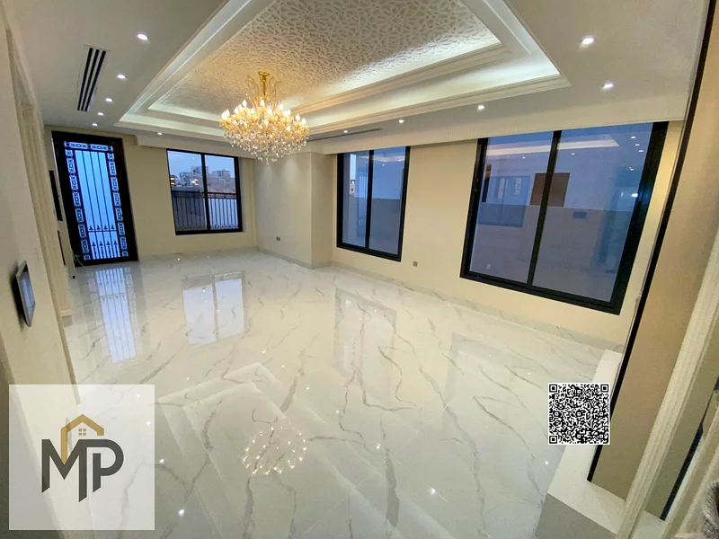 فيلا فاخرة بتصميم كلاسيكي في موقع متميز أمام مجمع أزها، وبسعر يشمل رسوم التسجيل ونقل الملكية.63898888625282114