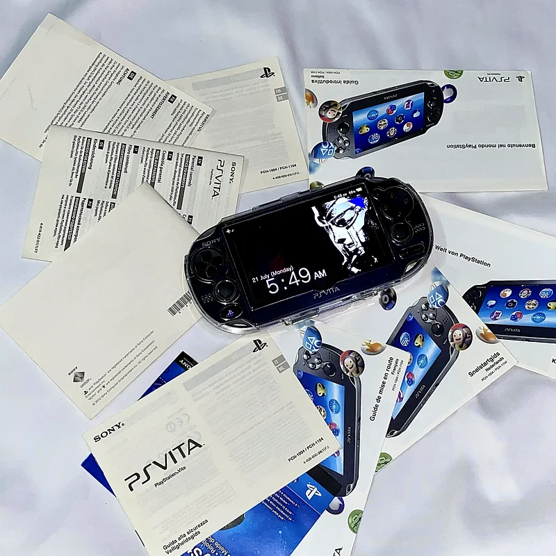 PS Vita with original box +150 games and more63231695283073111