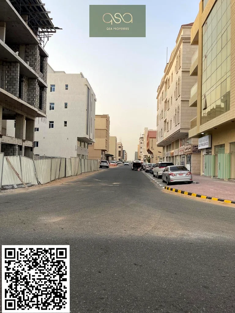 أفضل موقع | قطعة أرض تجارية وسكنية بمساحة طابق أرضي وثلاثة طوابق للبيع في منطقة ال علية، عجمان63199122520835112