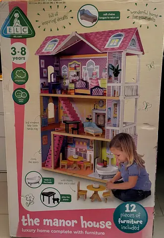 Pre-loved doll house with furniture