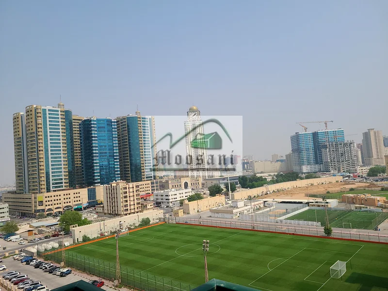 أكبر شقة من غرفتين وصالة للبيع بسعر 420,000 درهم في أبراج الرشيدية، عجمان63888487411585111