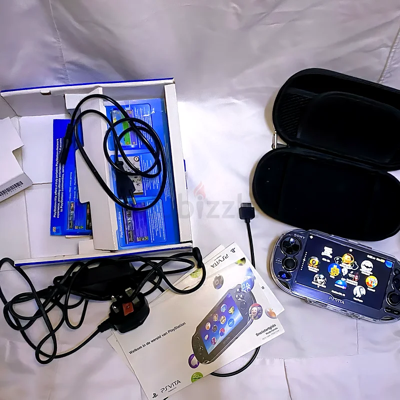 PS Vita with original box +150 games and more63231695283073112