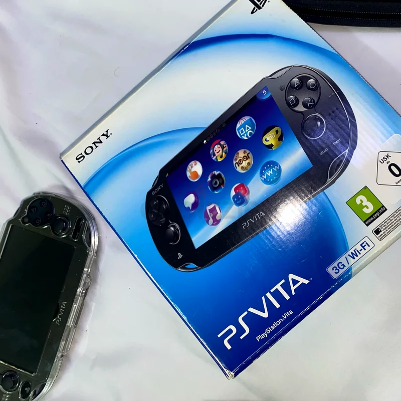PS Vita with original box +150 games and more63231695283073113