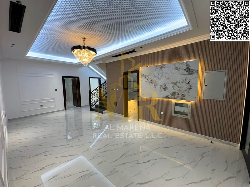 For sale in Al Harba, Ajman, a modern design, luxurious two-story townhouse villa with a roof, first resident in Al Helio 2, including registration an63898772812289112