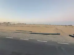 For sale in Sharjah: Corner plot of land in the Muzayra'a area, Al Rahmaniya suburb.