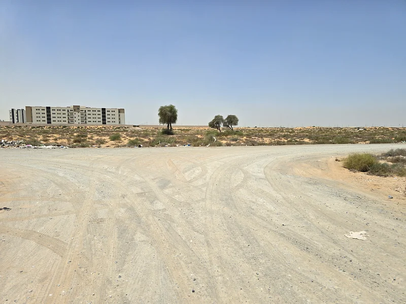 For sale, residential land, townhouse, Umm Al Quwain, on Sheikh Mohammed bin Zayed Road, next to Umm Al Quwain University63185196373634112