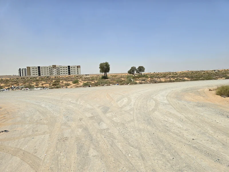 For sale, residential land, townhouse, Umm Al Quwain, on Sheikh Mohammed bin Zayed Road, next to Umm Al Quwain University63185196373634113