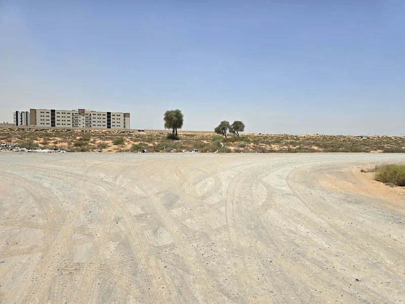 For sale, residential land, townhouse, Umm Al Quwain, on Sheikh Mohammed bin Zayed Road, next to Umm Al Quwain University63185196373634114