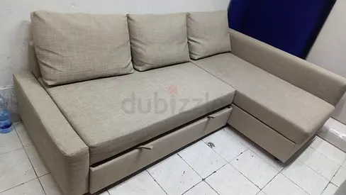 Selling ikea L shape sofa cum bed