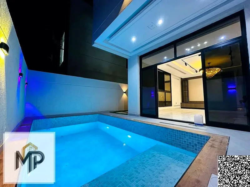 For sale, a modern villa, including registration fees, close to the mosque and services, with a seating area in the courtyard, with no down payment.63899766287106110