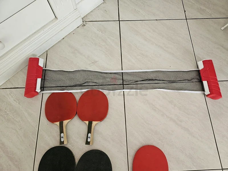 4 x pairs of Table Tennis Rackets  net. Perfect for professionals and Family Fun! 8 branded rac63243674220033111
