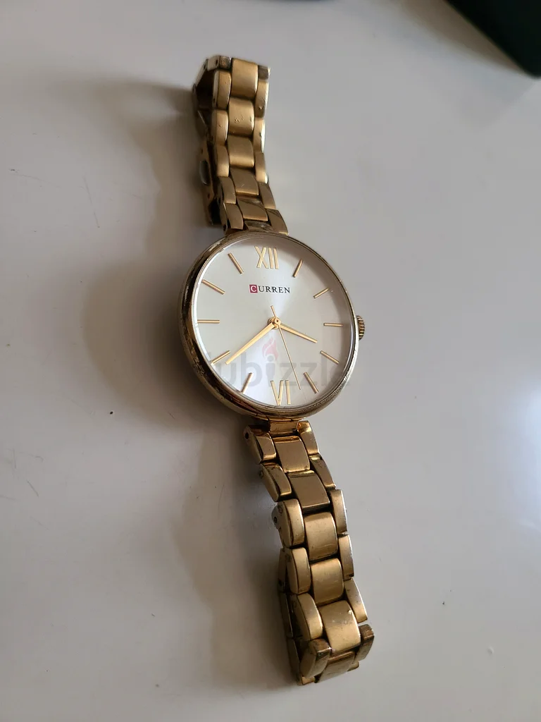 Elegant Gold Tone Womens Watch - Timeless Style!63240631990530111