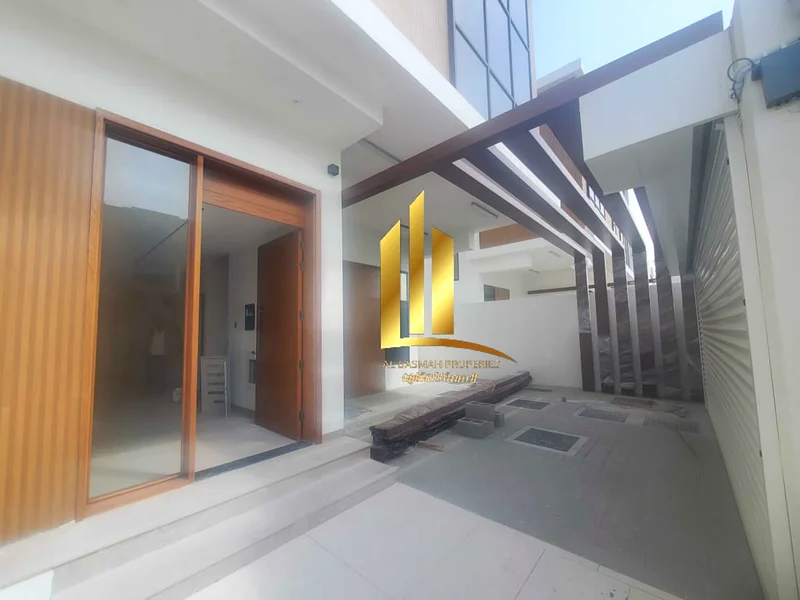 For sale, a luxurious villa with super deluxe finishing in Al-Hawshi, Sharjah, freehold for Arab brothers63205334409473111