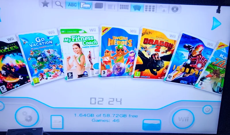 Nintendo Wii with Wii Fit Balance Board,2 controllers and 45 loaded games63231194935683114