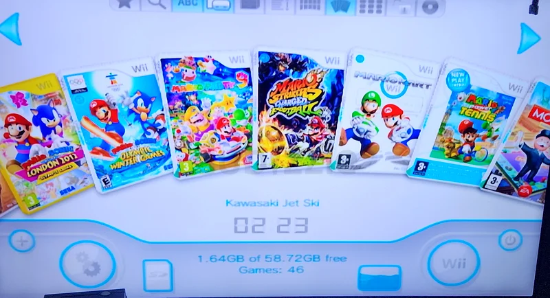 Nintendo Wii with Wii Fit Balance Board,2 controllers and 45 loaded games63231194935683112