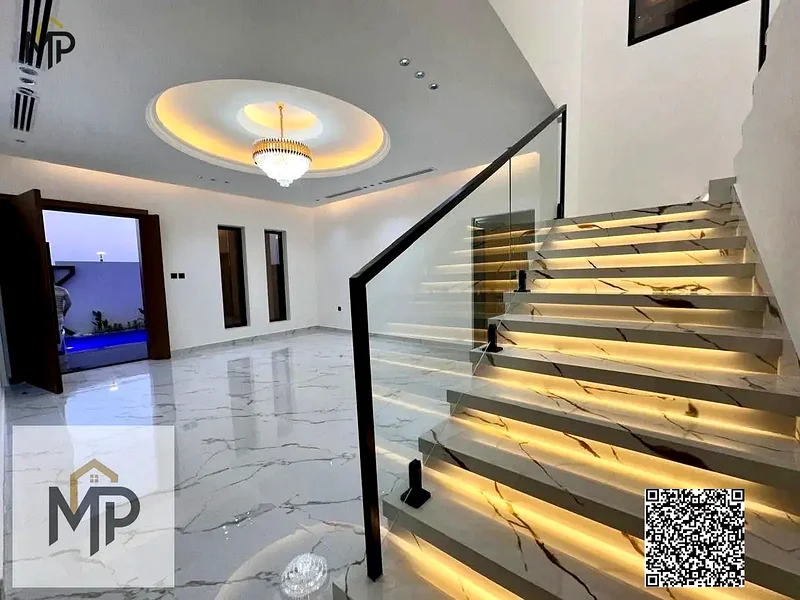 For sale - a luxury villa with a swimming pool in a prime location in Ajman, high-end finishing, modern design, including registration and swimming63899337053443112