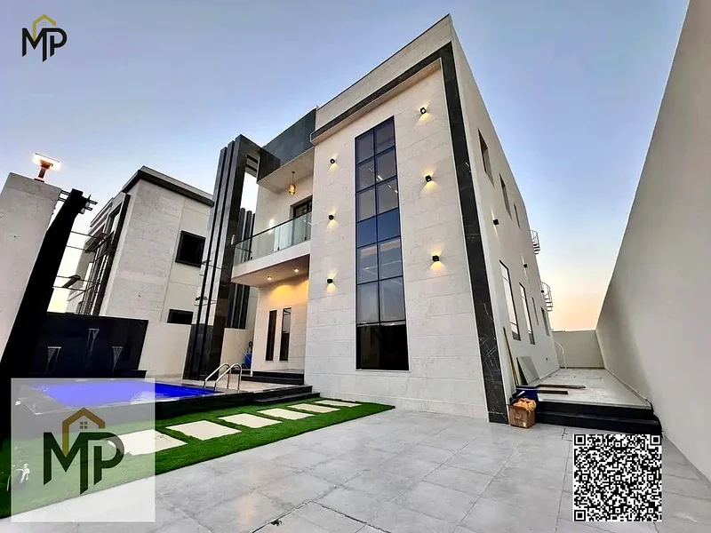 For sale - a luxury villa with a swimming pool in a prime location in Ajman, high-end finishing, modern design, including registration and swimming63899337053443110