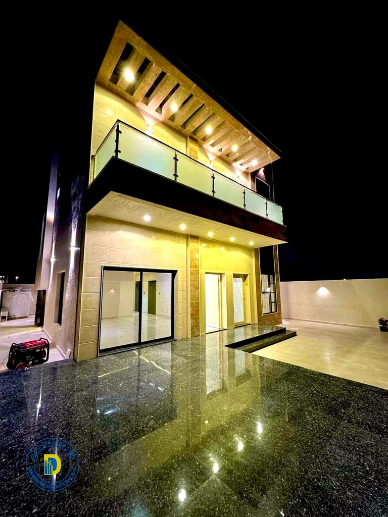 For sale at a fantastic price, a modern villa with 3 rooms in the Al Helio 1 area, Ajman, super deluxe finishing, freehold , bank financing63892120963330111
