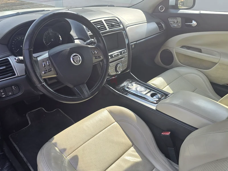 Well maintained classic British sports tourer. Old English white paint with ivory leather interior.63221302959745114