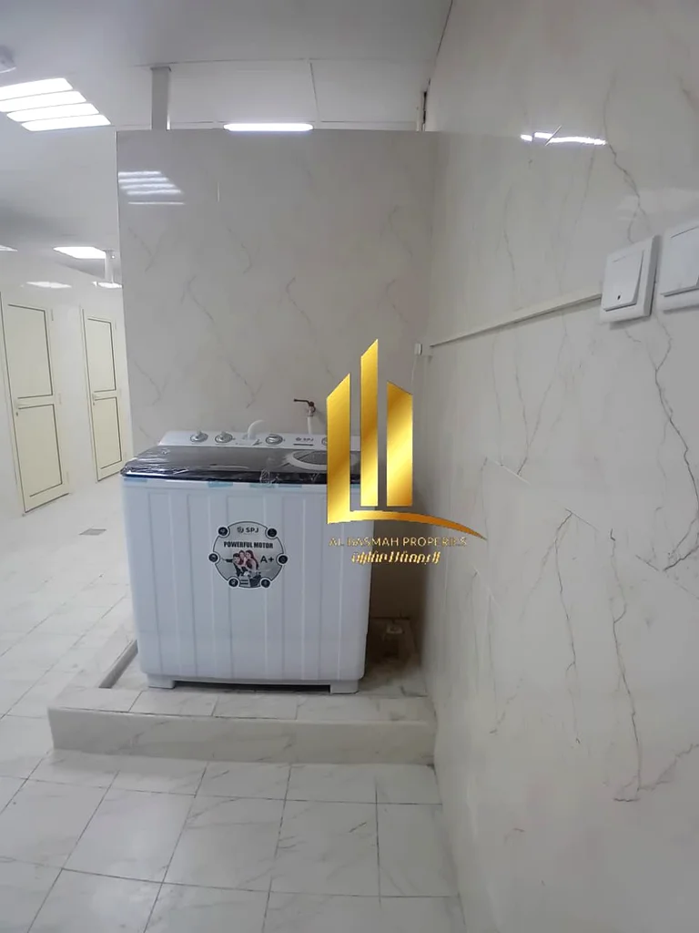 Workers' accommodation for sale in Al Sajaa Industrial City, on an area of ​​20,000 square feet, rented with an annual income of 700,000 dirhams.63195071185026113