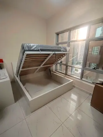 Ikea hydraulic king size bed frame with storage inside bed and with Ikea pocket sprung  mattress