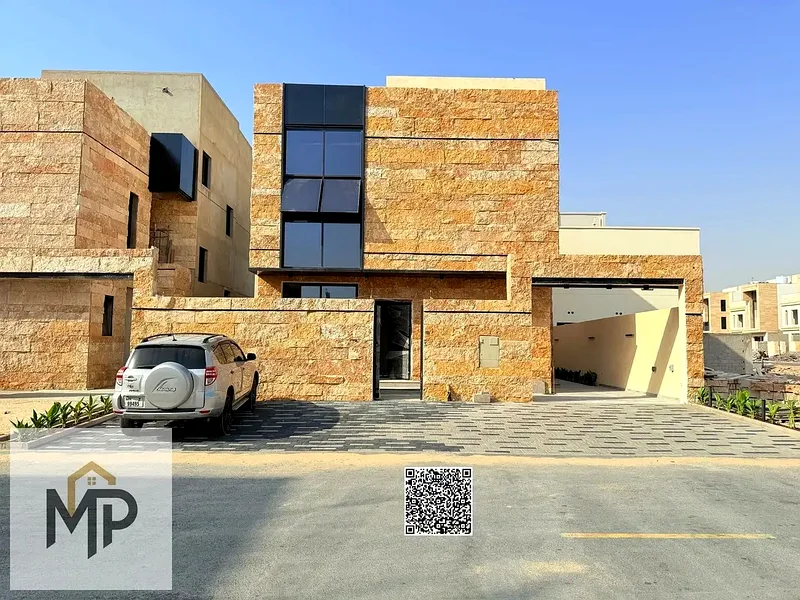 Villa for sale - two floors and a large courtyard - close to Sheikh Mohammed bin Zayed Road - freehold for all nationalities for life -63171304767233111