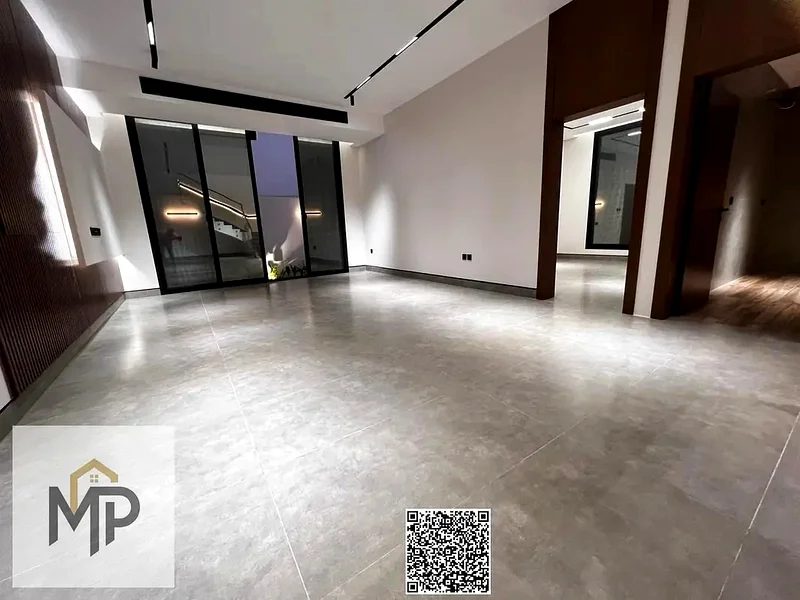 Villa for sale - two floors and a large courtyard - close to Sheikh Mohammed bin Zayed Road - freehold for all nationalities for life -63171304767233114