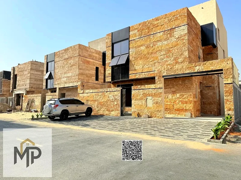 Villa for sale - two floors and a large courtyard - close to Sheikh Mohammed bin Zayed Road - freehold for all nationalities for life -63171304767233112